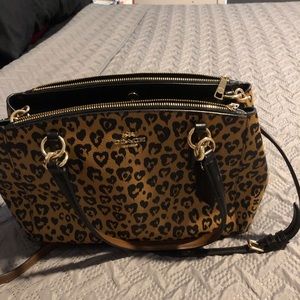 Gently used coach bag “wild at Heart”. Design